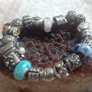 PANDORA Sterling Silver Bracelet with Retired Charms